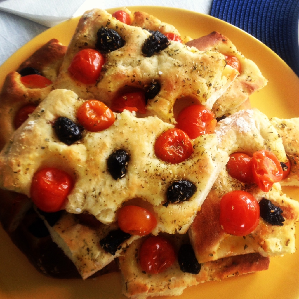 focaccia with cherry tomatoes and black olives